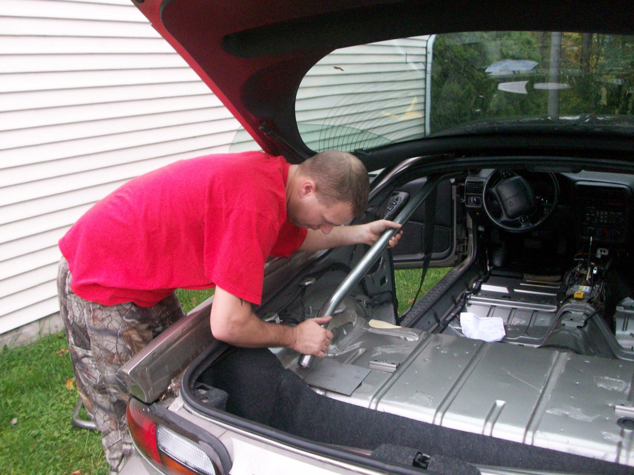 Installing the roll cage in the Camaro