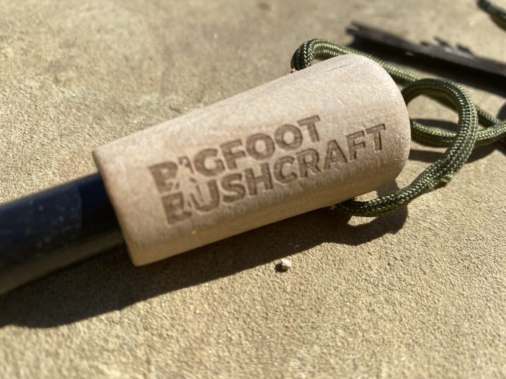 Wooden handle of the Bigfoot Bushcraft Ferro Rod
