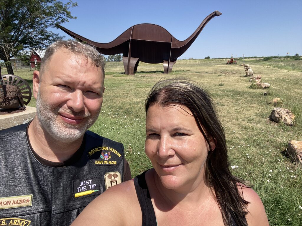 day 3 headed to sturgis and we stopped for a quick picture with a metal dinasour