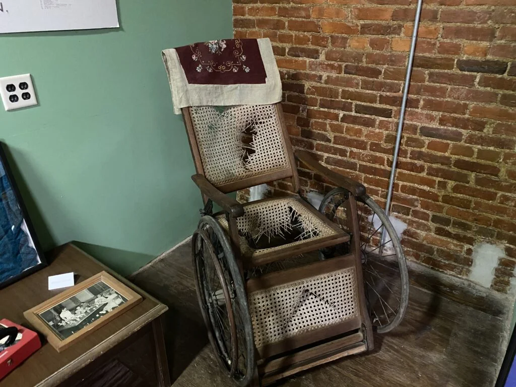 Trans-Allegheny old wheel chair in room