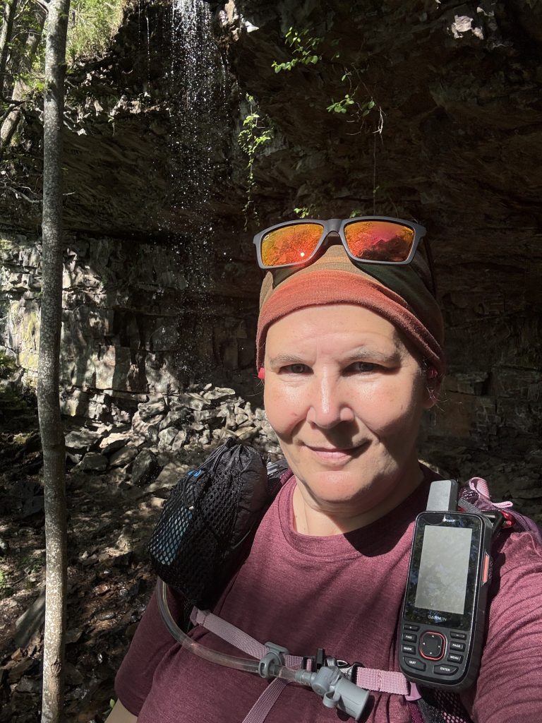 nutty hiker standing in front of Keown Falls
