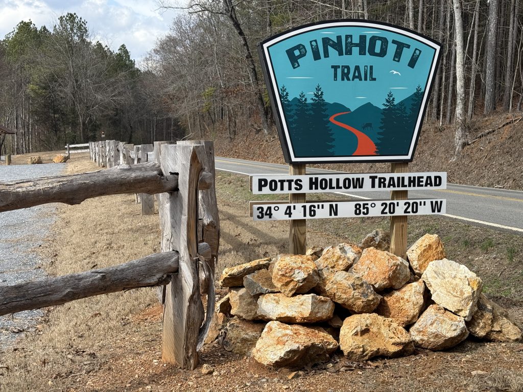 pinhoti trail day 32 potts hollow trailhead sign next to a road