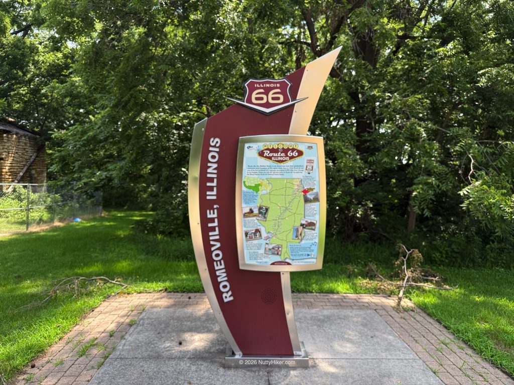 route 66 rday 3 omeoville, illinois marker with a map and route 66 symbol on it