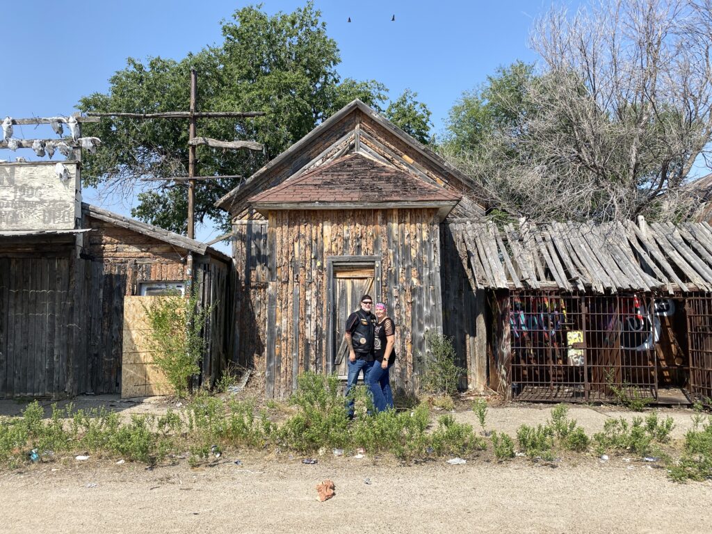 sturgis 2024 day 7 standing in front of an old building in Scenic south dakota