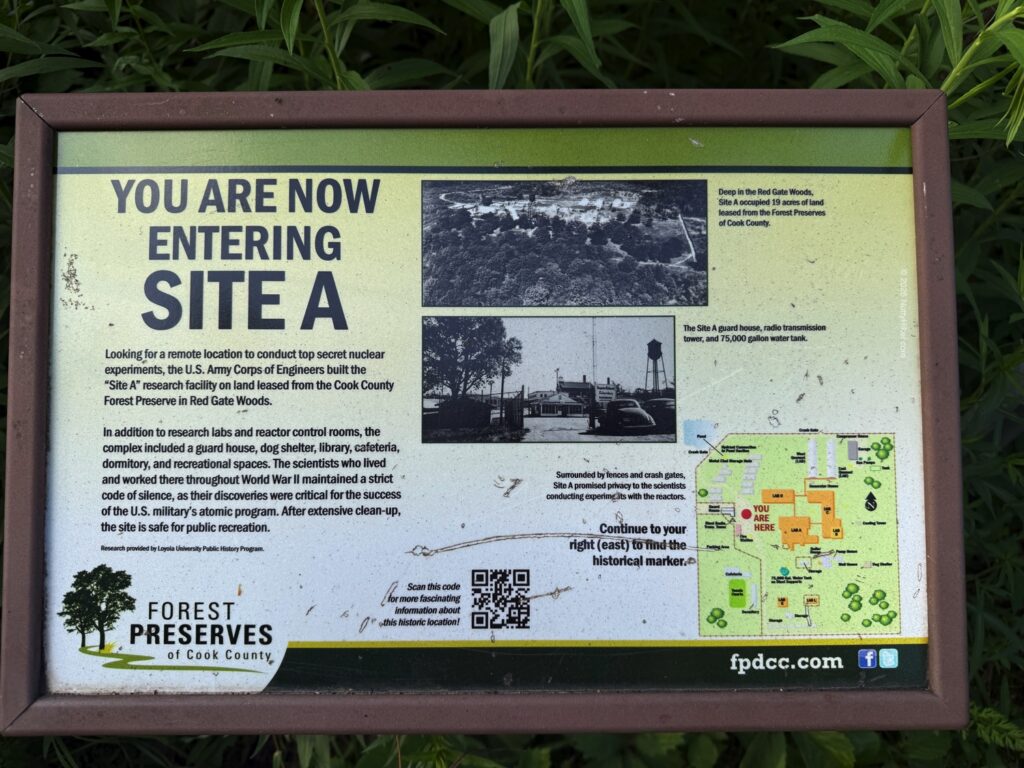 Informational sign titled "You Are Now Entering Site A," describing the history and purpose of the Site A nuclear research facility in Red Gate Woods, Cook County, with historical images and a map.