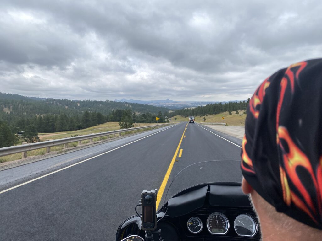 Sturgis 2024 day 12 - view of devils tower from a motorcycle