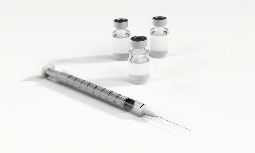 Image of a needle, syringe, flu shot